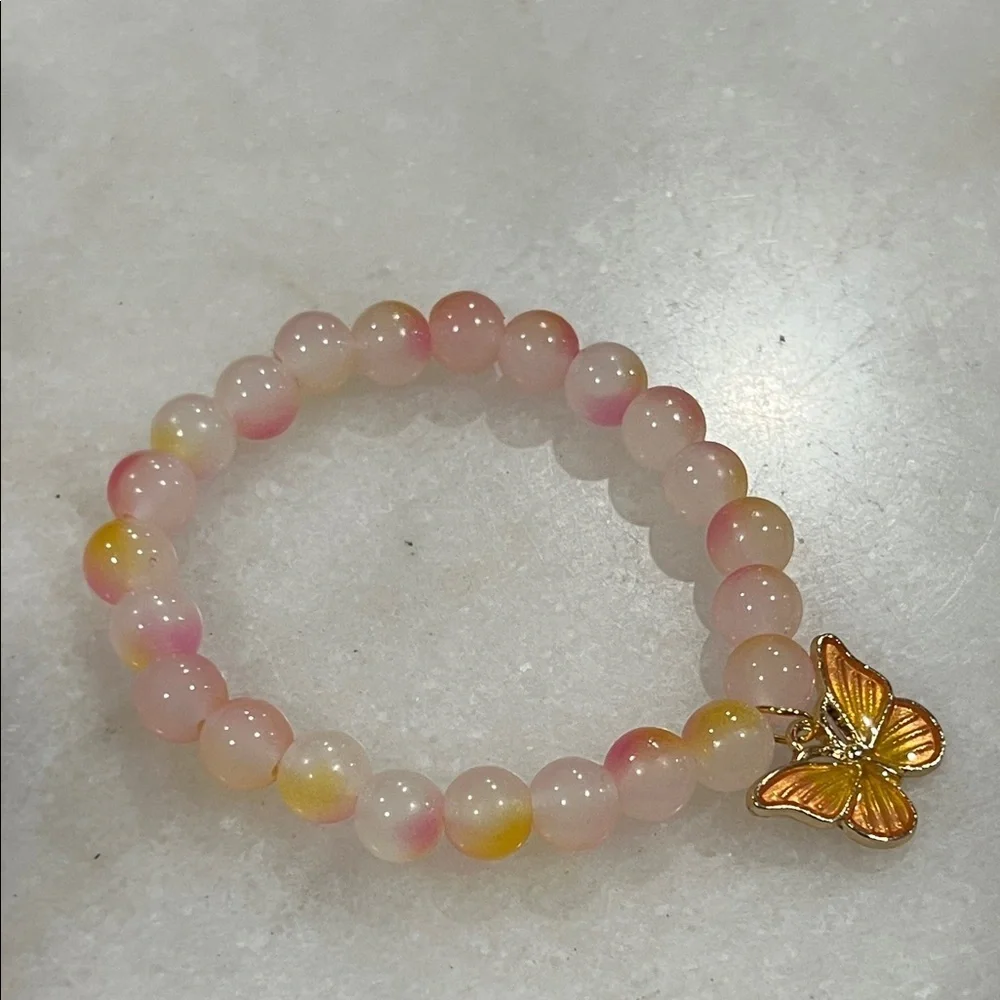 Elegant Pink and Yellow Beaded Bracelet with Butterfly Charm